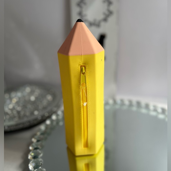 Other - NWOT Yellow silicon Pencil-Shaped Pencil Case